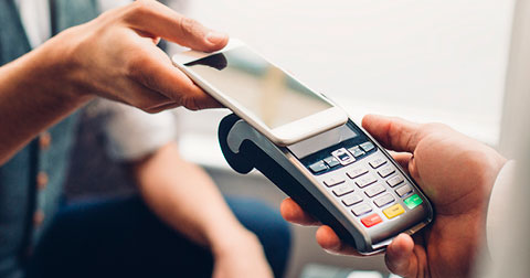 customer paying with smartphone